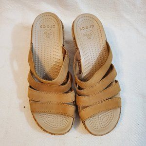 Crocs tan or khaki cork wedge sandals. W5